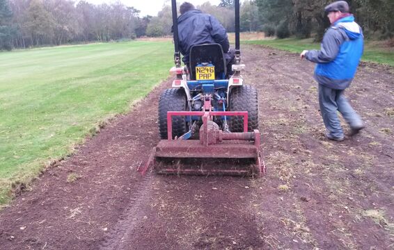Scarifying to expose buried seed